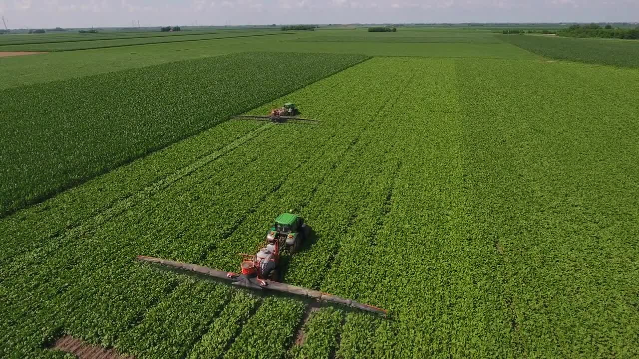 Tractors Watering Crop Stock Video Motion Array
