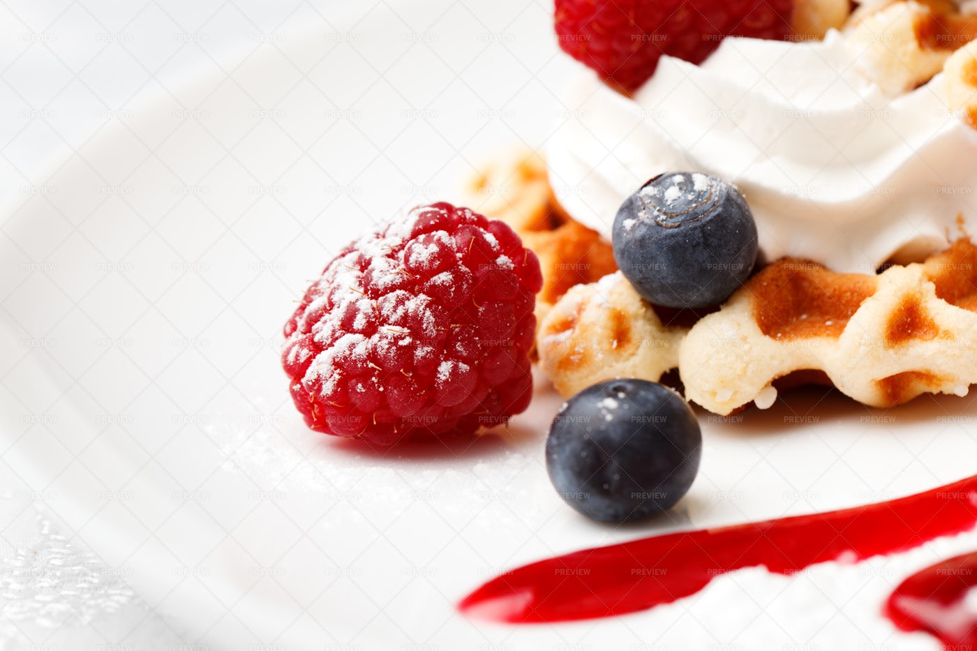 Golden Waffle Served With Cream And Berr: Stock Photos