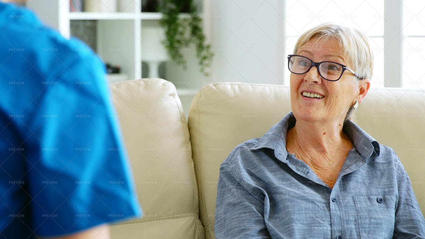 Woman Sitting On Couch In A Nursing Home: Stock Photos