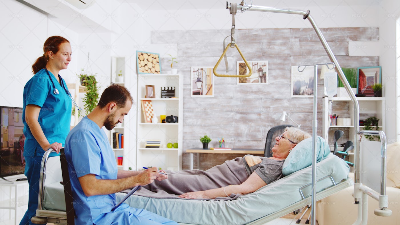 Nurses Checking On Patient: Stock Photos