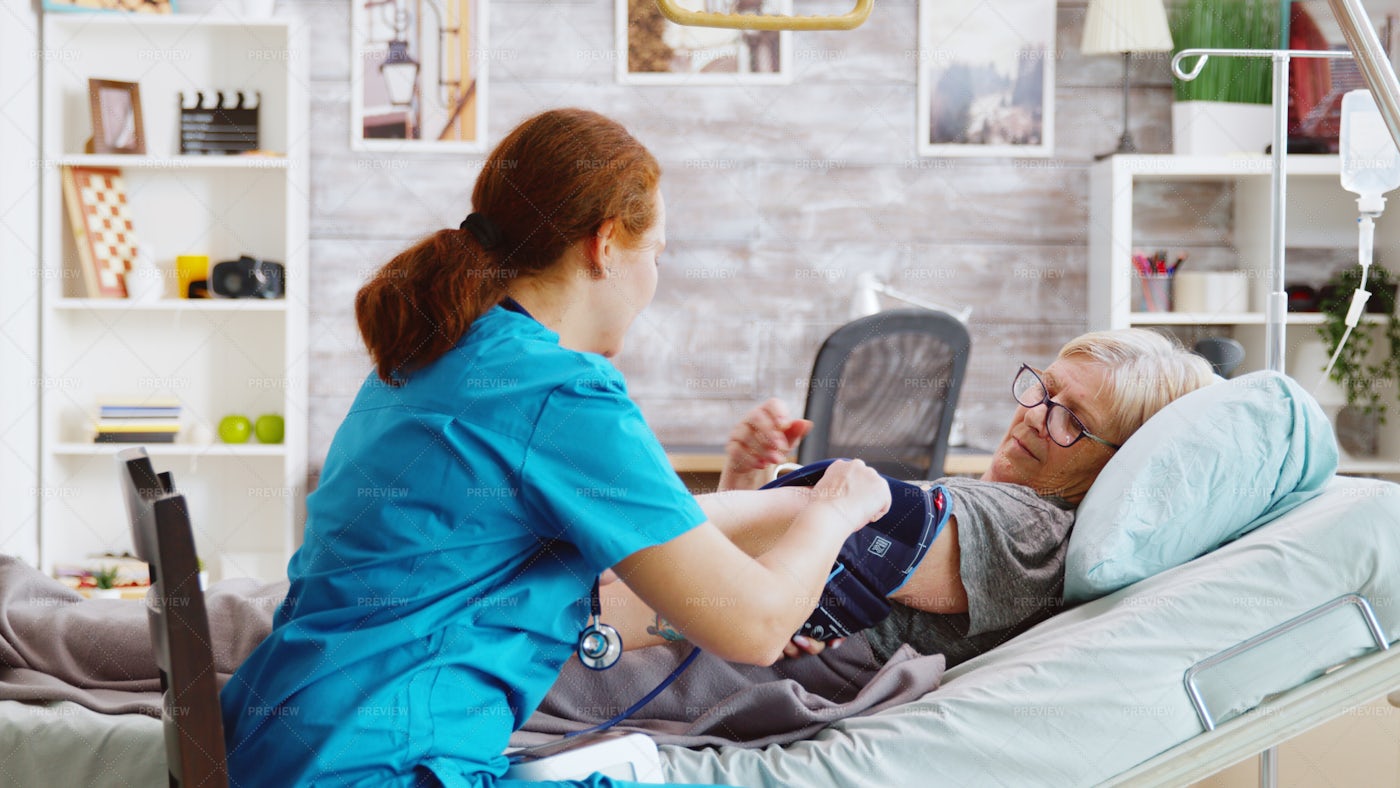 Nurse Takes Blood Measurements: Stock Photos