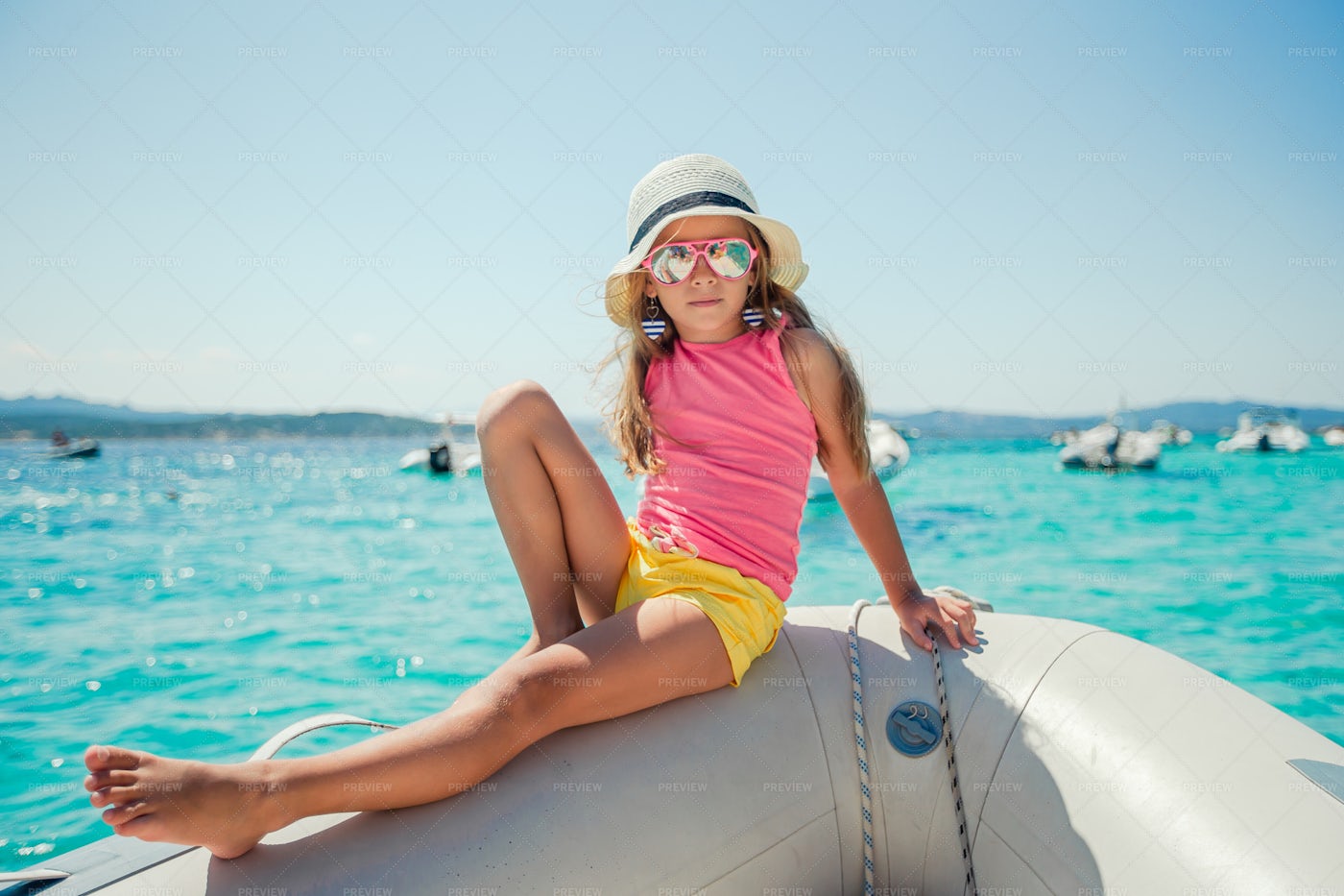 Little Girl Sailing At The Beach: Stock Photos