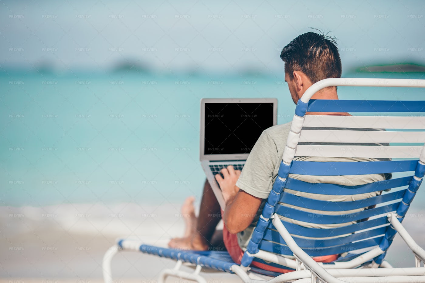 Working On The Beach: Stock Photos