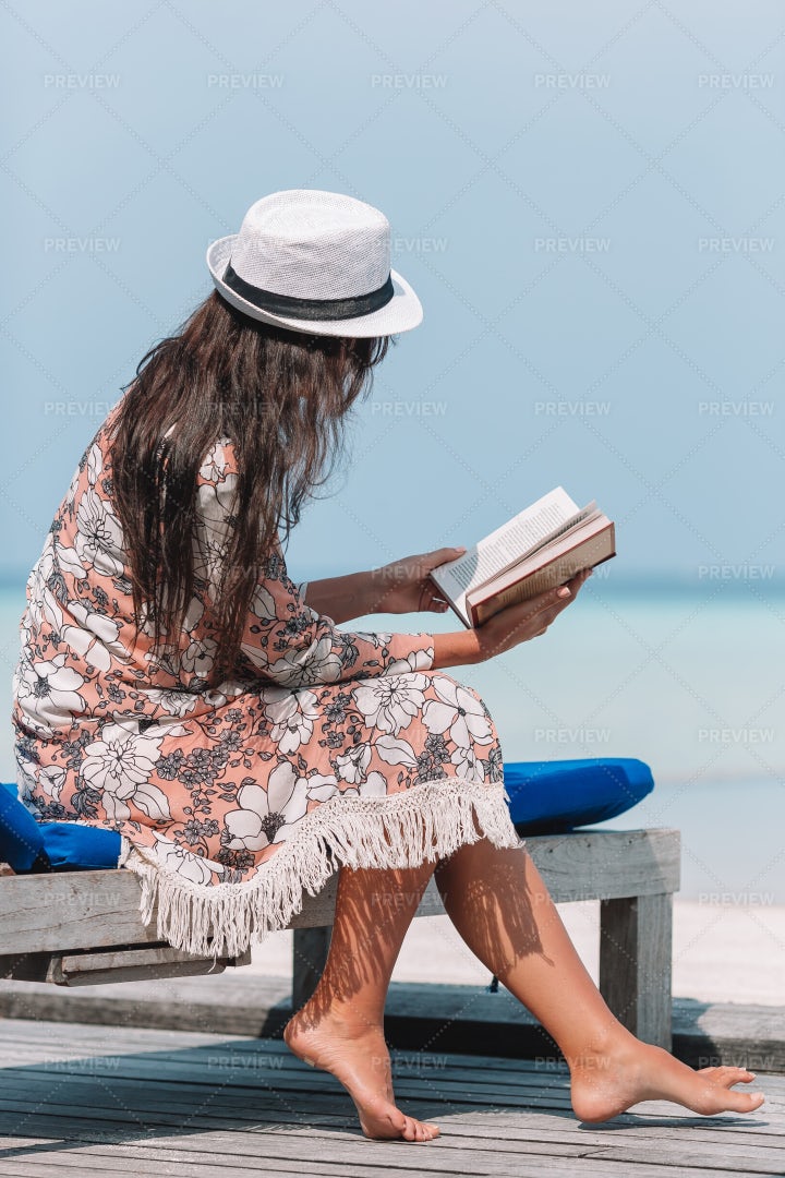 Reading Beside The Beach: Stock Photos