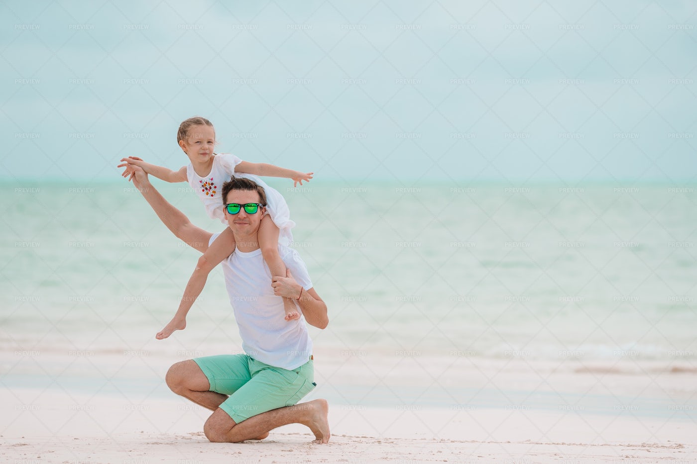 Cheerful Father And Little Daughter: Stock Photos