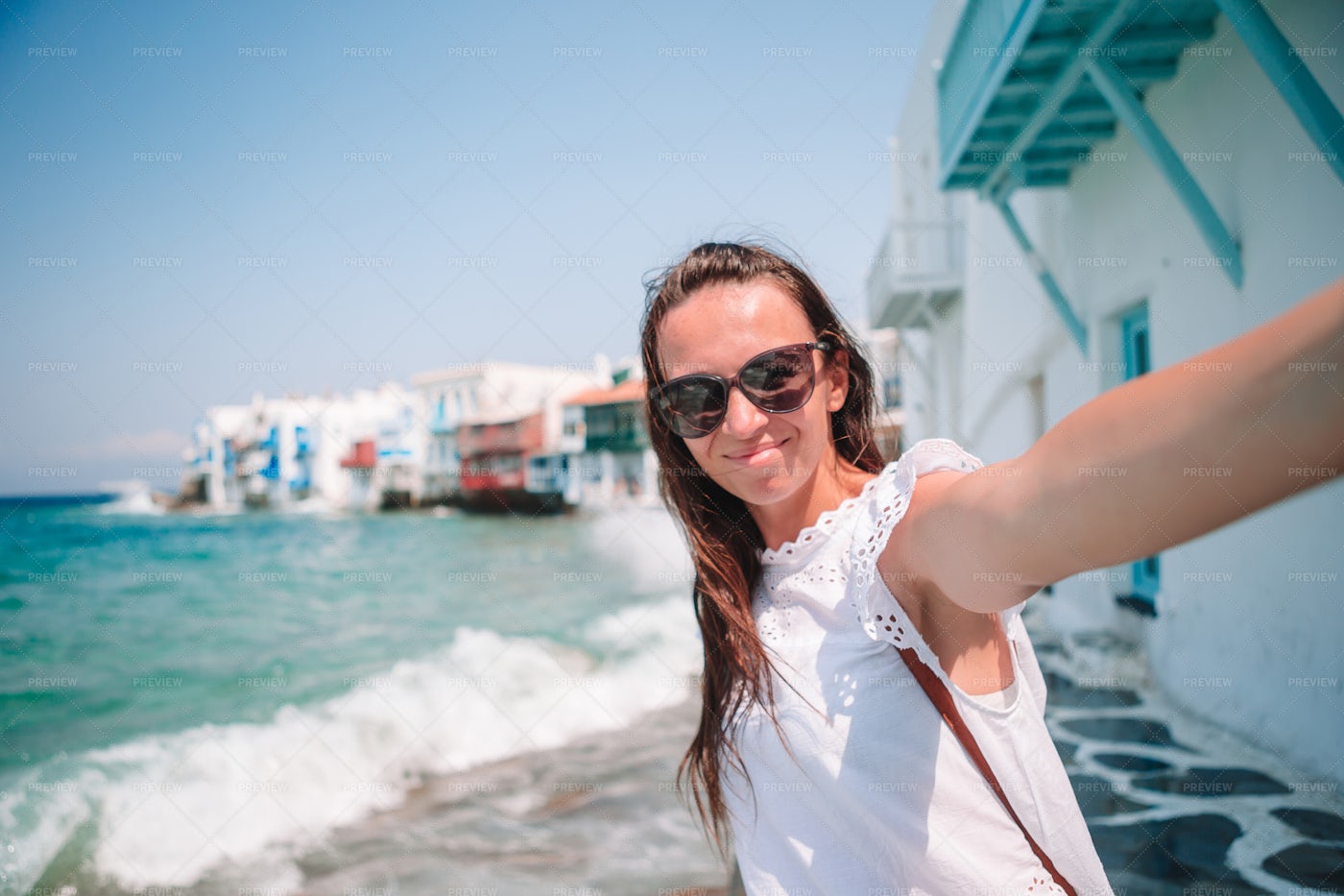 Woman Taking Selfies In Mykonos: Stock Photos