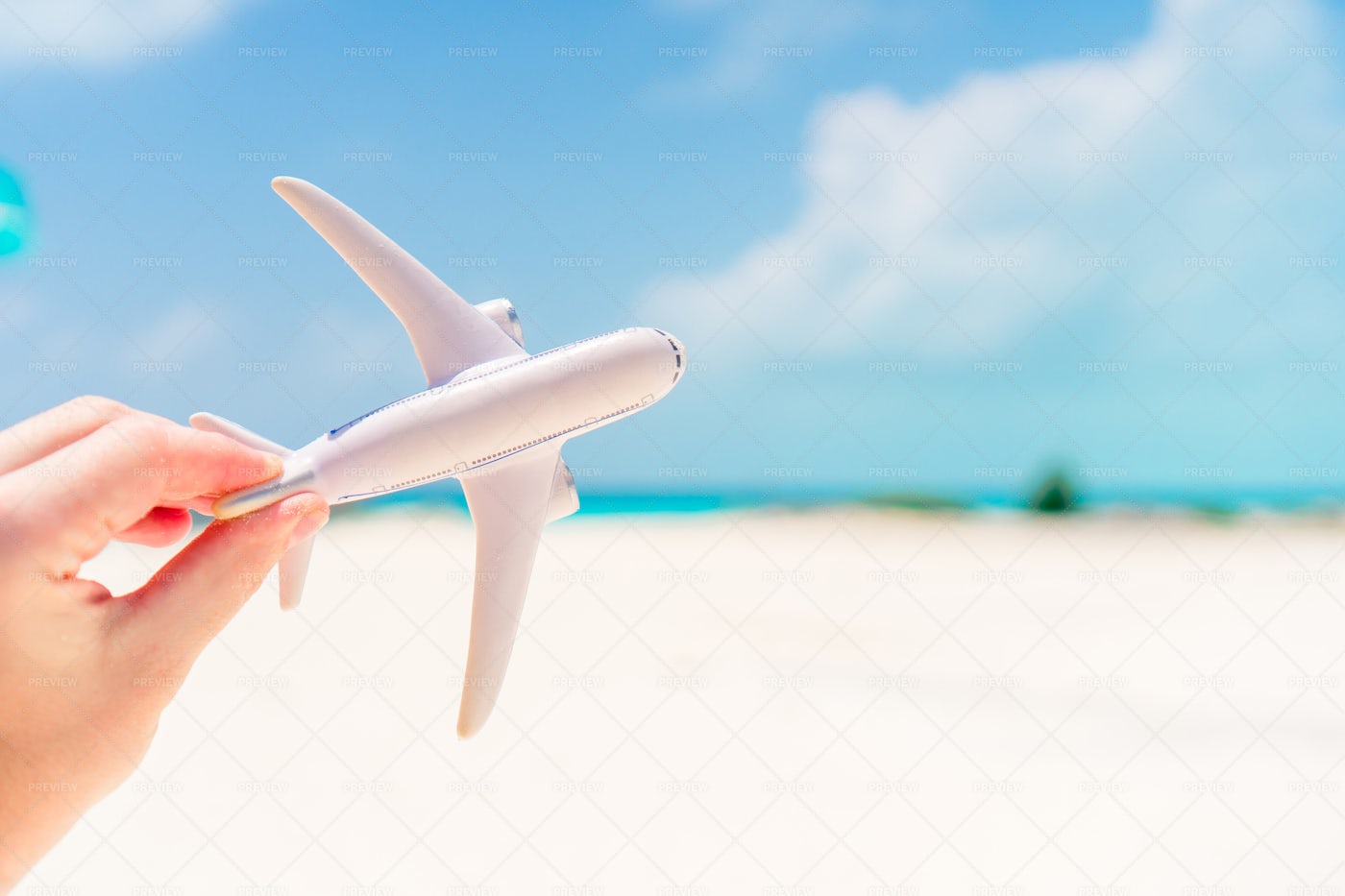 Airplane Toy On The Beach: Stock Photos