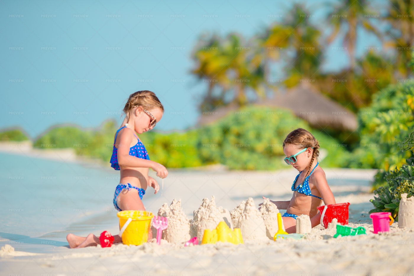 Two Kids Making Sand Castles: Stock Photos