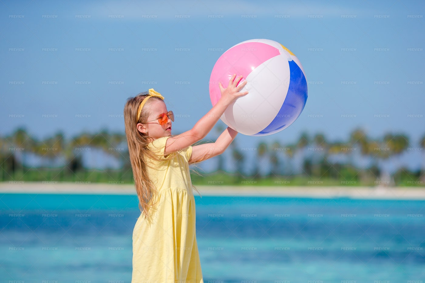 Playing With A Beach Ball: Stock Photos