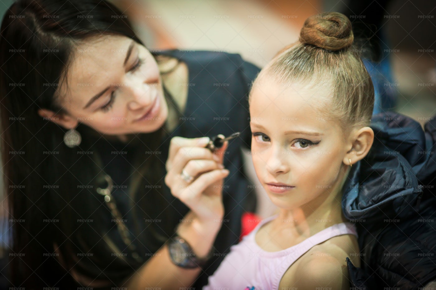 Mother Making Up Her Little Daughter: Stock Photos
