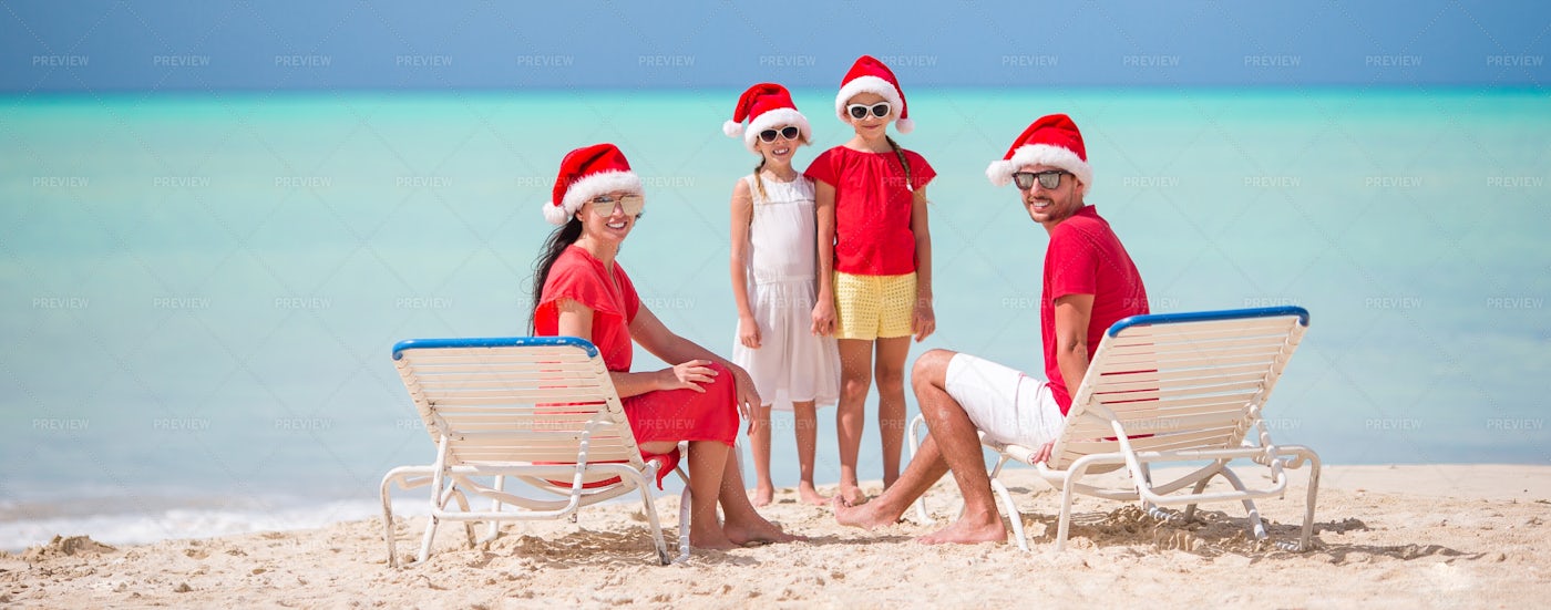 Dressed As Santa On The Beach: Stock Photos