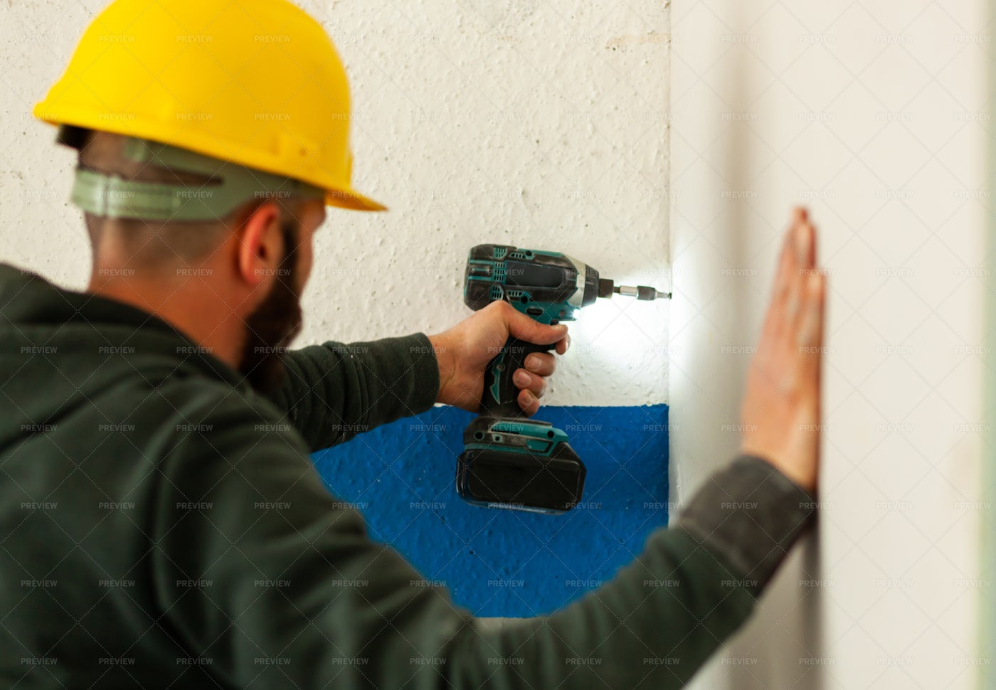 Drilling Into A Wall: Stock Photos