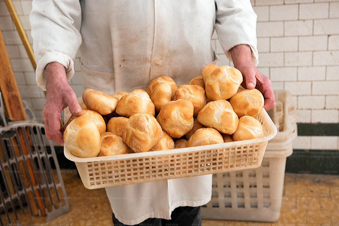 Baker Holding A Bread Basket: Stock Photos