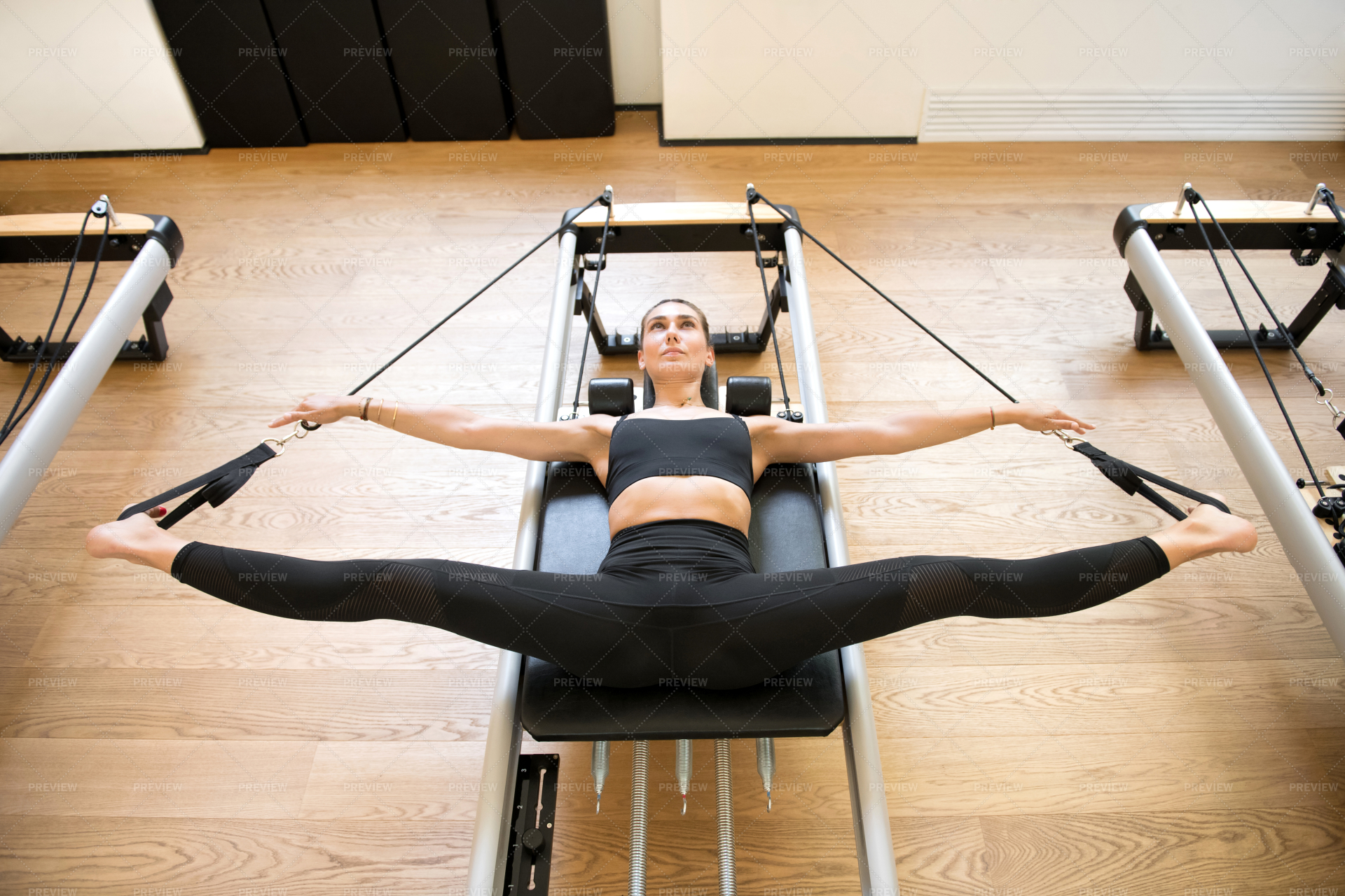 Woman Using Pilates Machine Stock Photos Motion Array   Preview 434915 I6FaVK6enSZXbWiY Large 