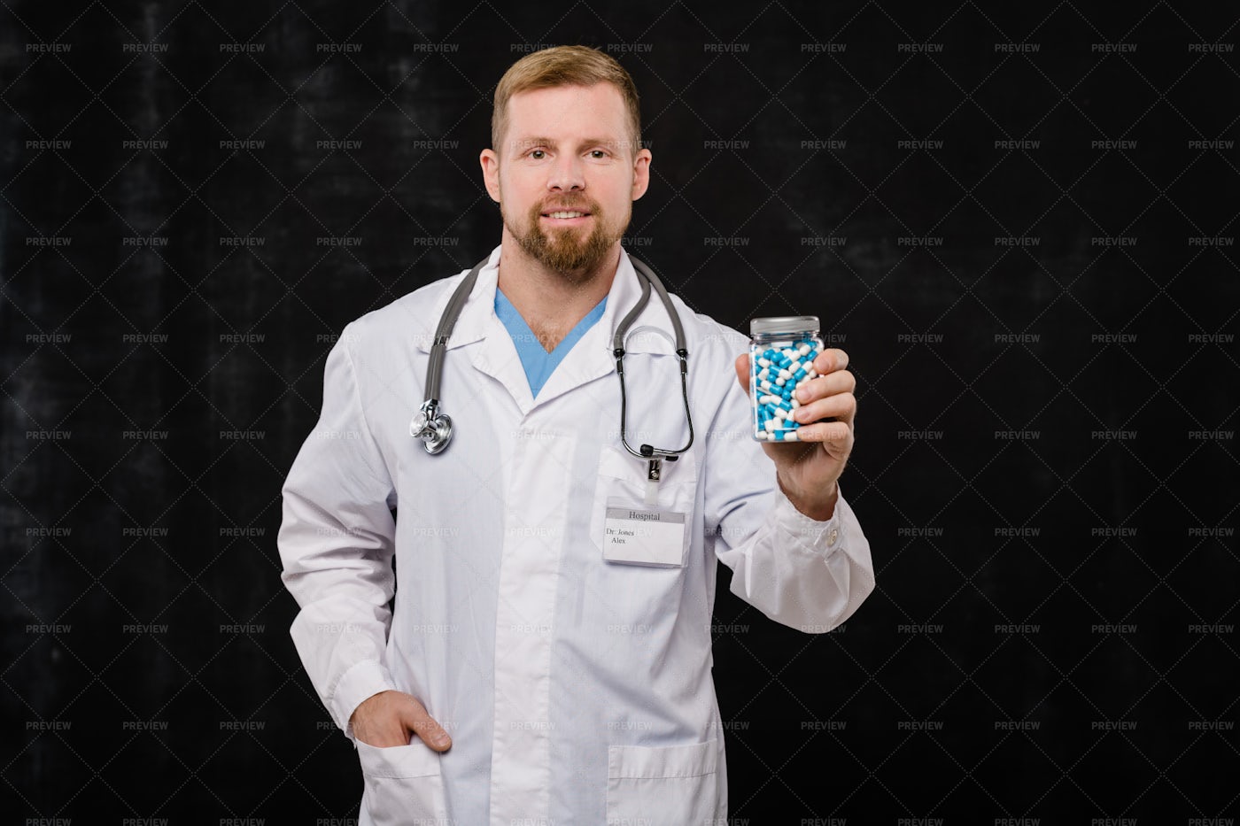 Happy Young Bearded Doctor In...: Stock Photos