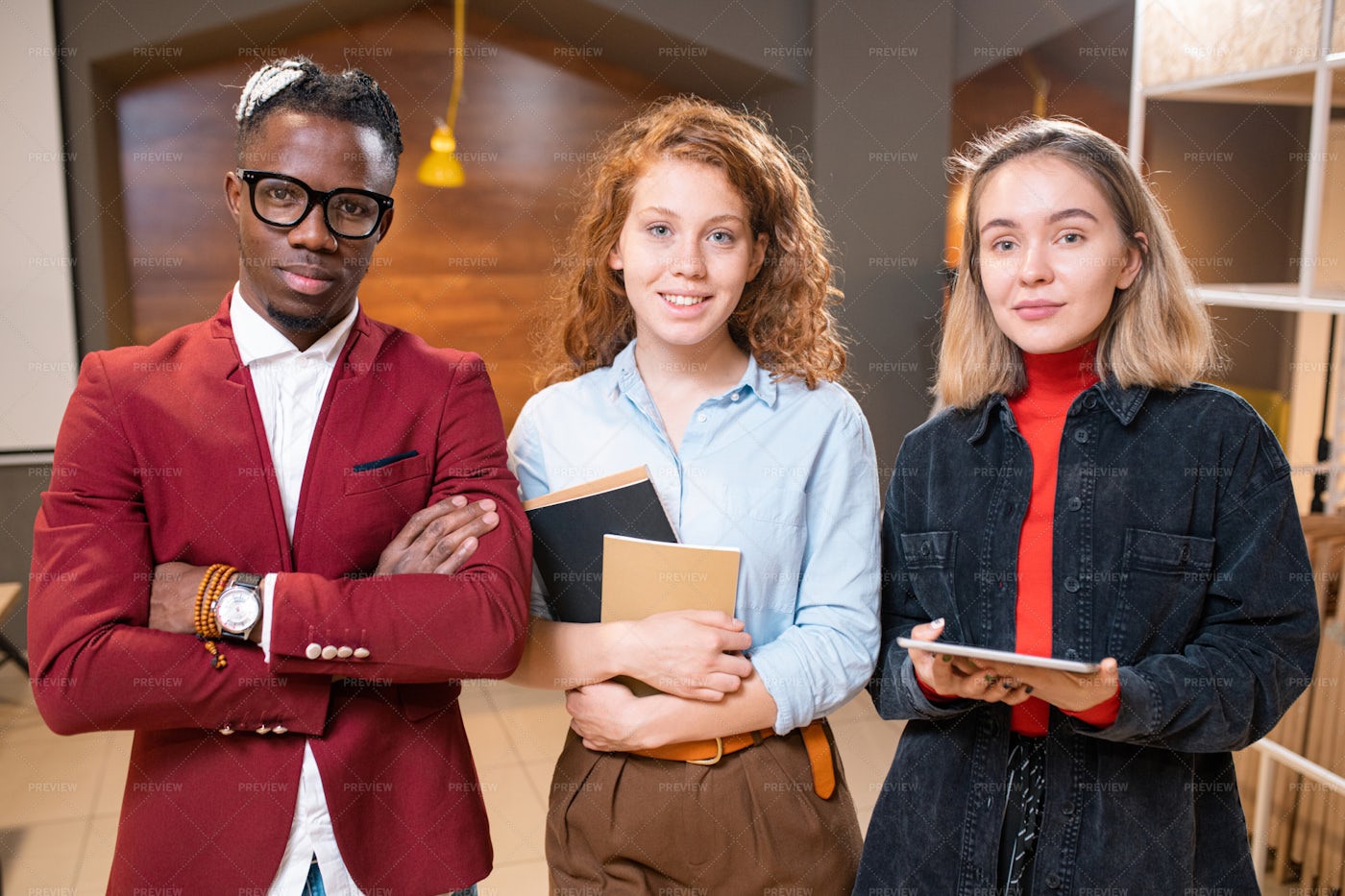 Three Young Intercultural College...: Stock Photos