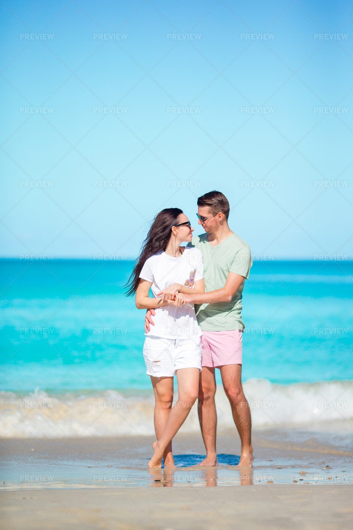 A Beach Vacation Embrace: Stock Photos