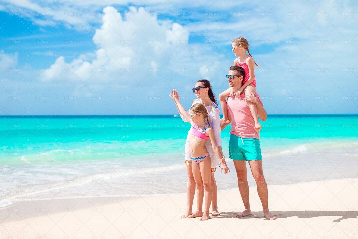Family Looks To The Ocean: Stock Photos