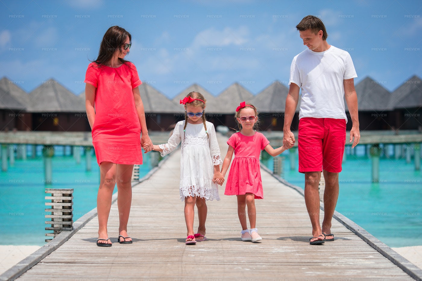 Happy Family On The Pier: Stock Photos