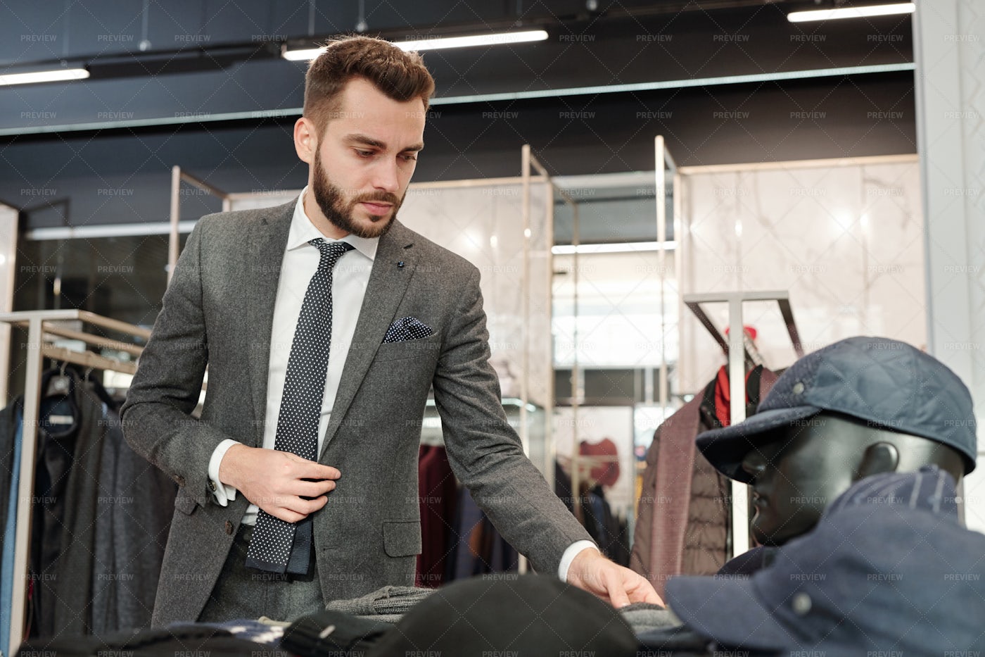 Young Man In Elegant Suit Looking...: Stock Photos