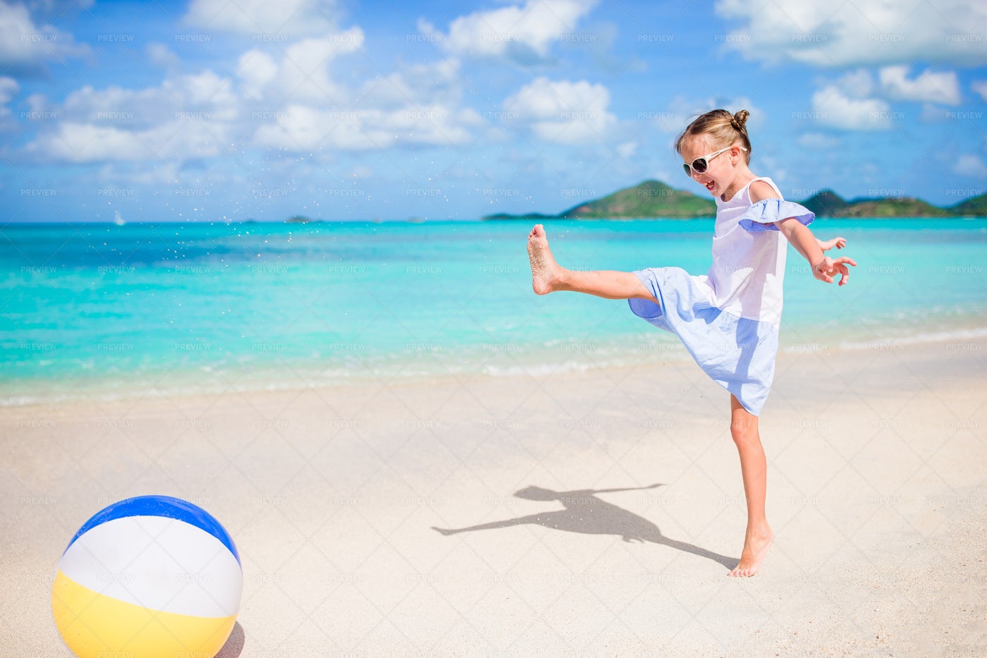 Girl Playing With Ball: Stock Photos