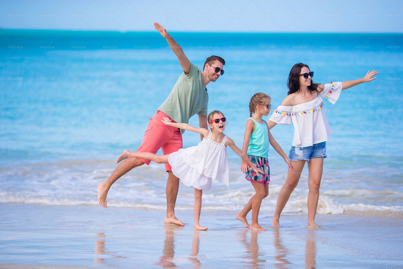 Happy Family On Beach - Stock Photos | Motion Array