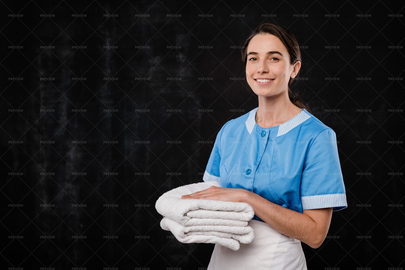 Pretty Young Smiling Hotel Maid...: Stock Photos
