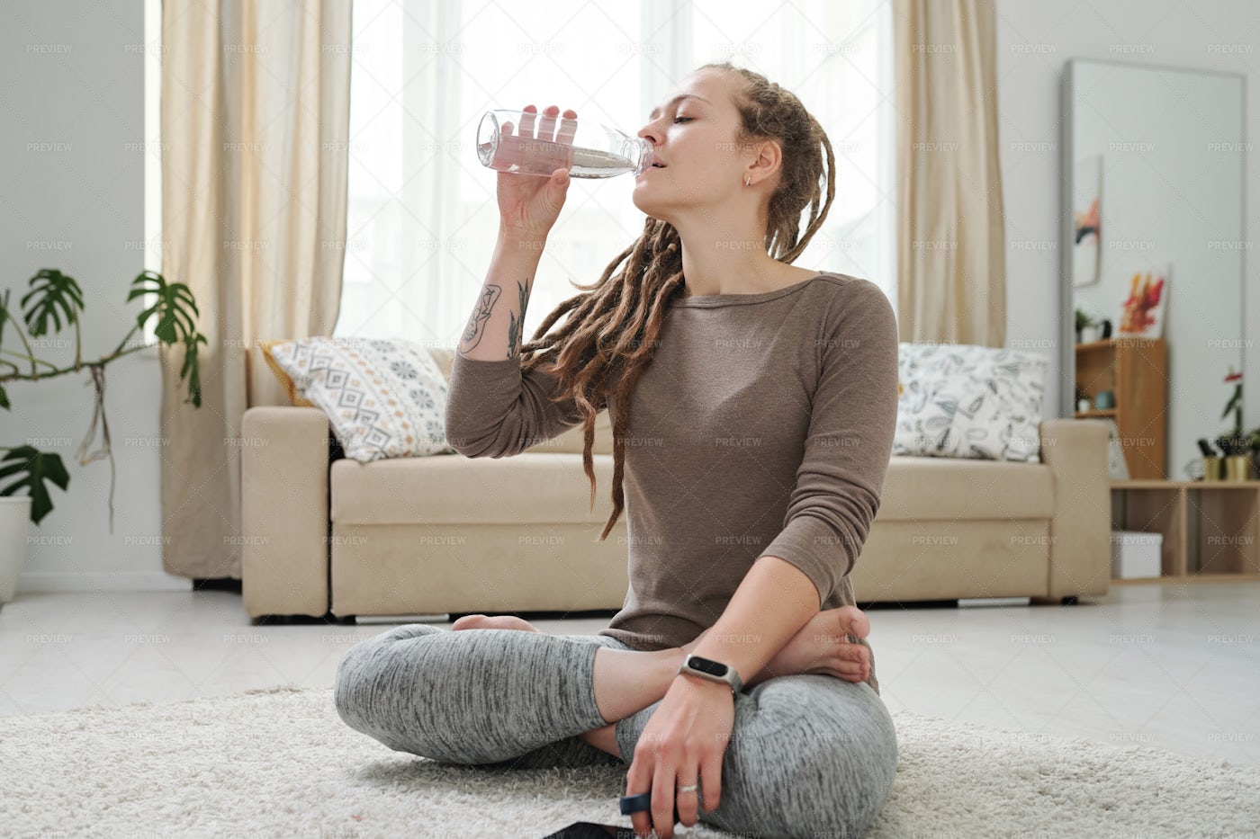 Thirsty Young Woman Drinking Water...: Stock Photos