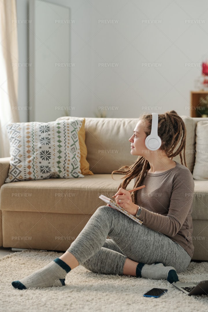 Female With Headphones Getting...: Stock Photos