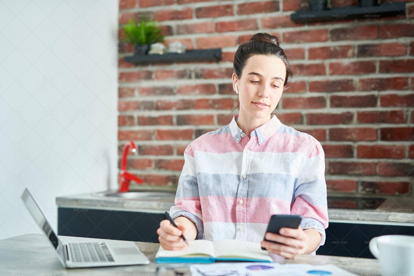 Modern Young Woman Working From...: Stock Photos