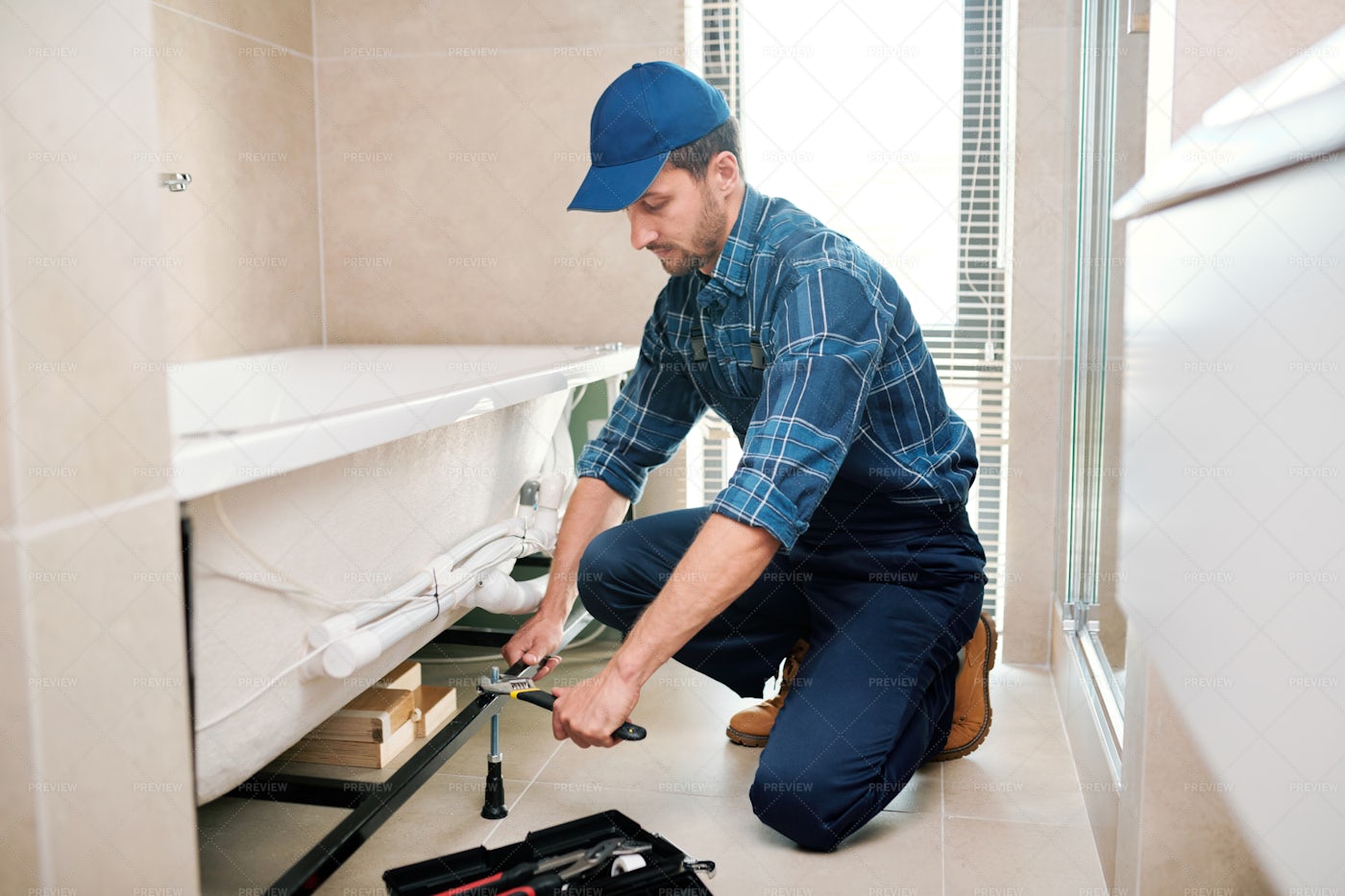 Young Plumber Or Technician...: Stock Photos