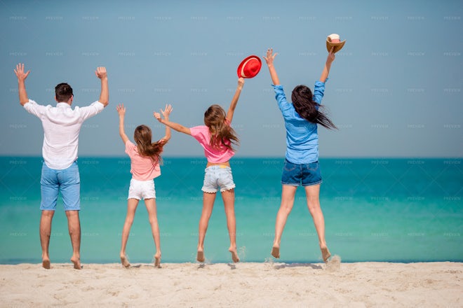 Happy Family On The Beach - Stock Photos | Motion Array