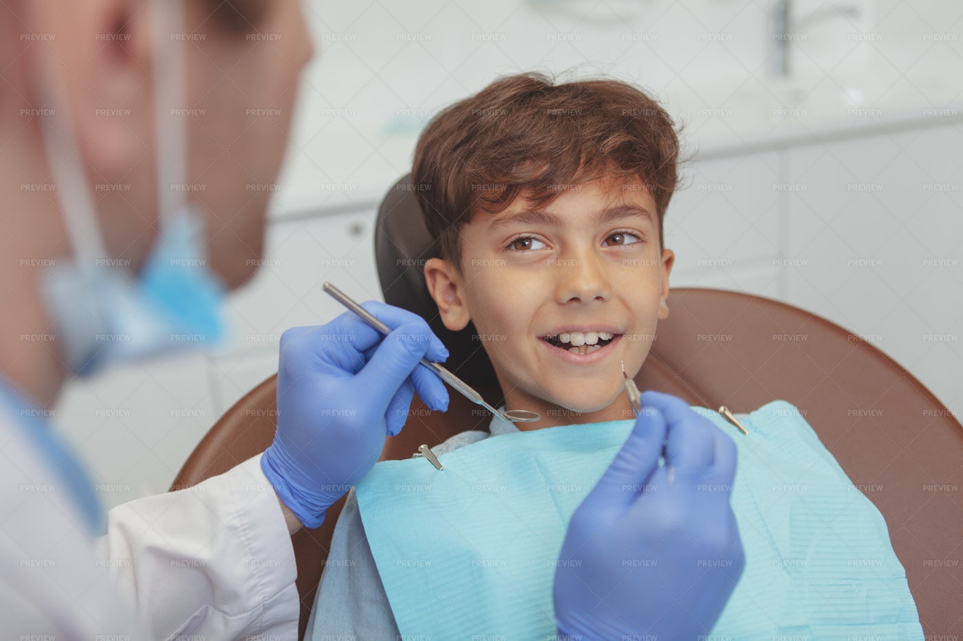 Kid Receives Dental Check-Up: Stock Photos