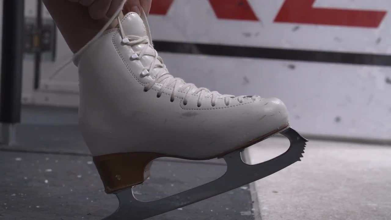 Tying Laces Of Ice Skates Stock Video Motion Array