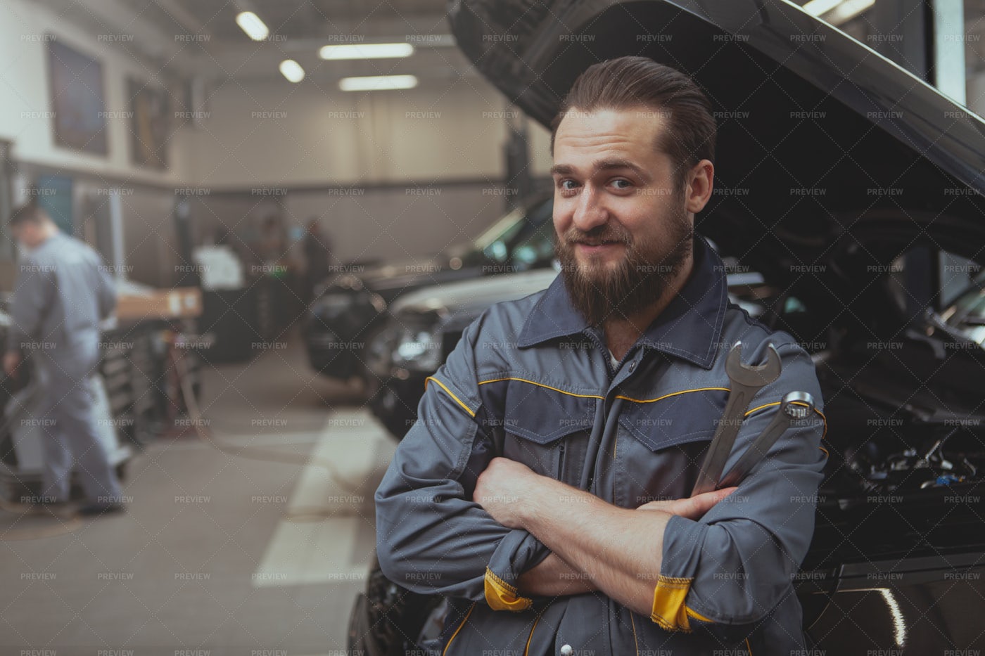 Car Mechanic With Wrench: Stock Photos