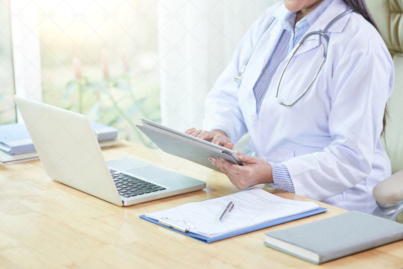 Female Doctor At Work: Stock Photos