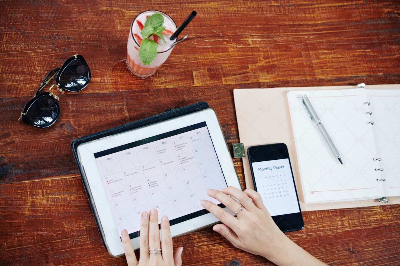 Woman Checking Planner App: Stock Photos