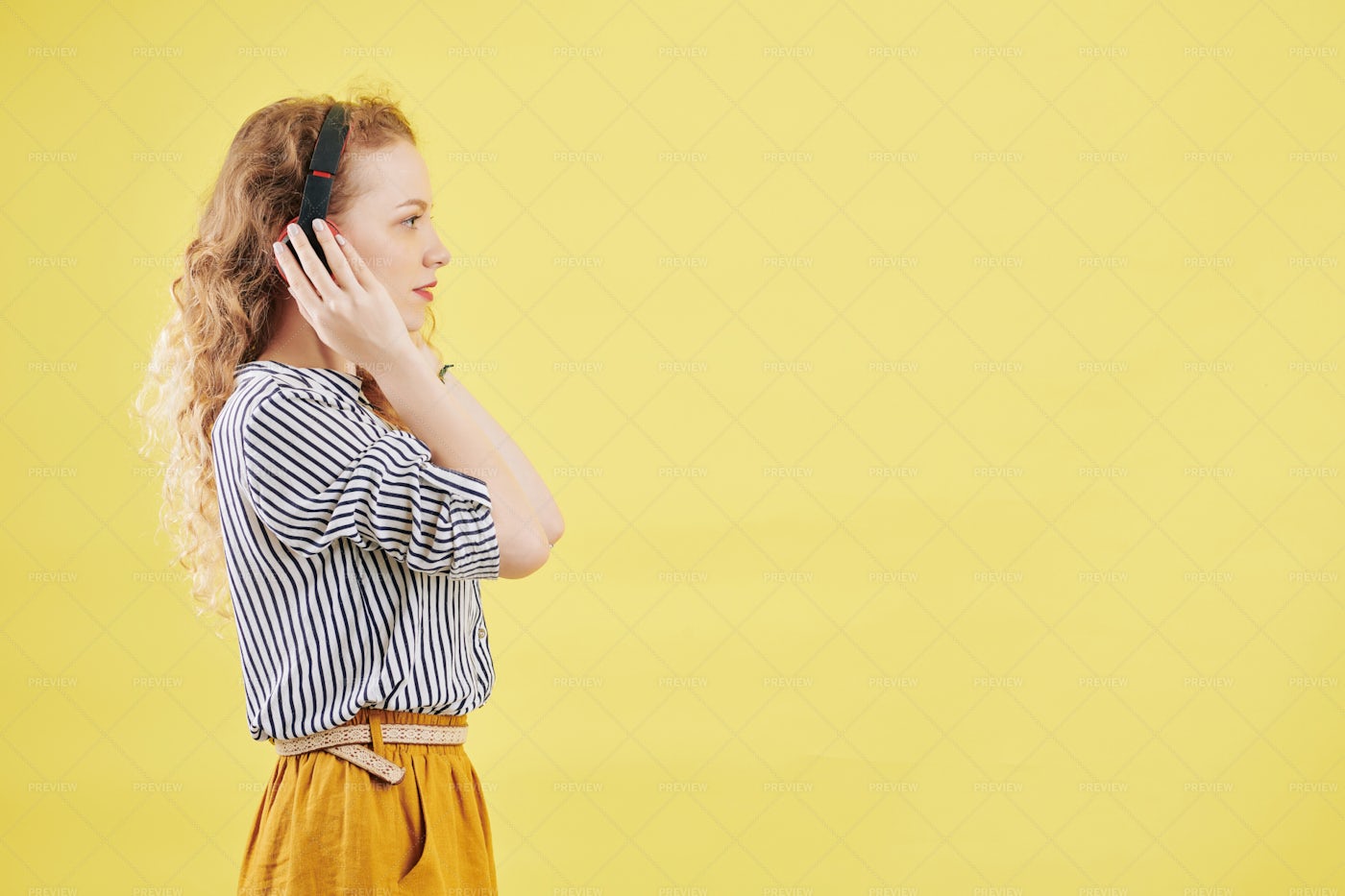 Young Woman Listening Audiobook: Stock Photos