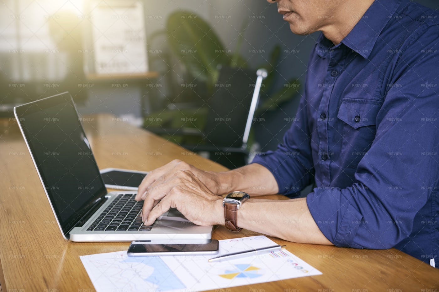 Businessman Working At Office With: Stock Photos