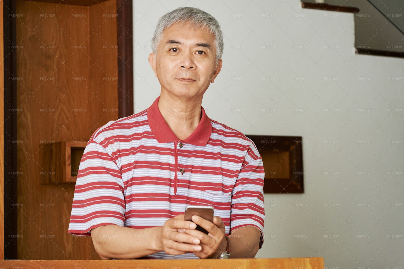 Asian Man With Smartphone: Stock Photos