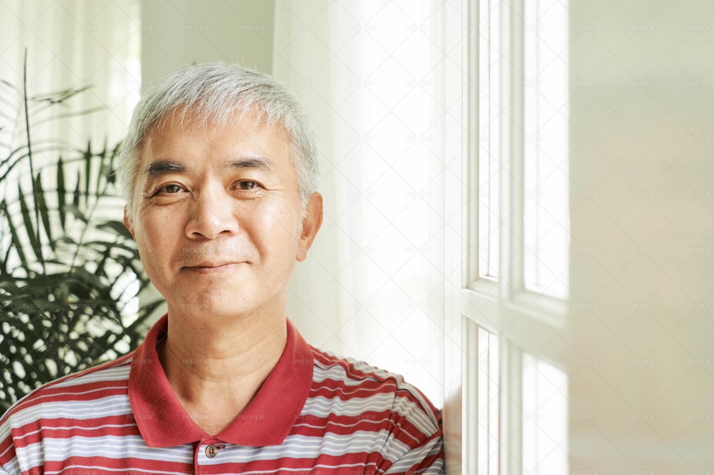 Positive Asian Man: Stock Photos