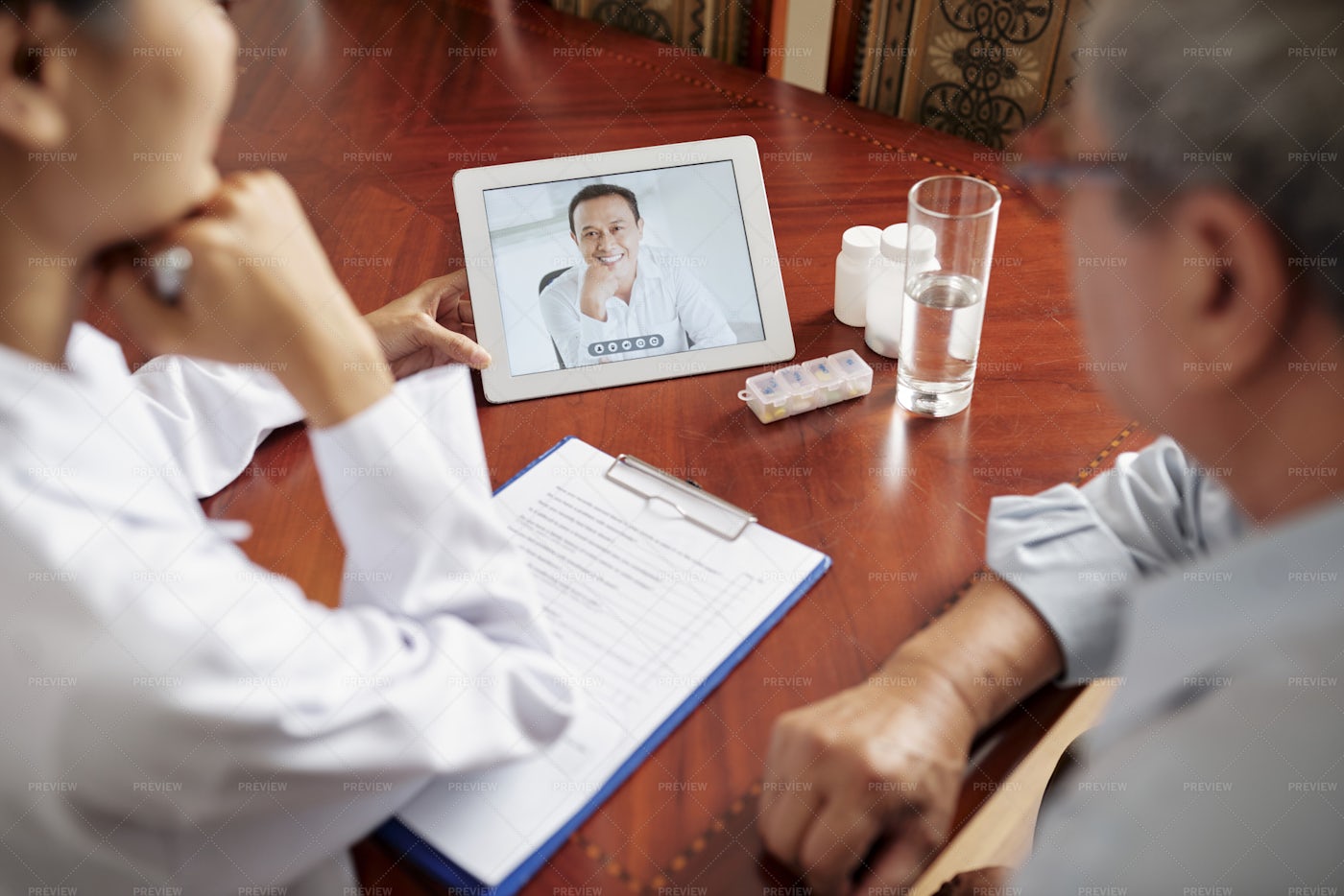 Nurse With Patient Have Online: Stock Photos