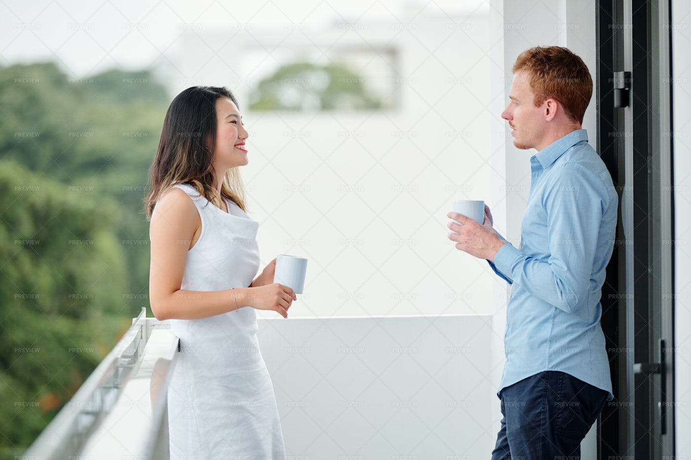 People Drinking Coffee At Balcony: Stock Photos
