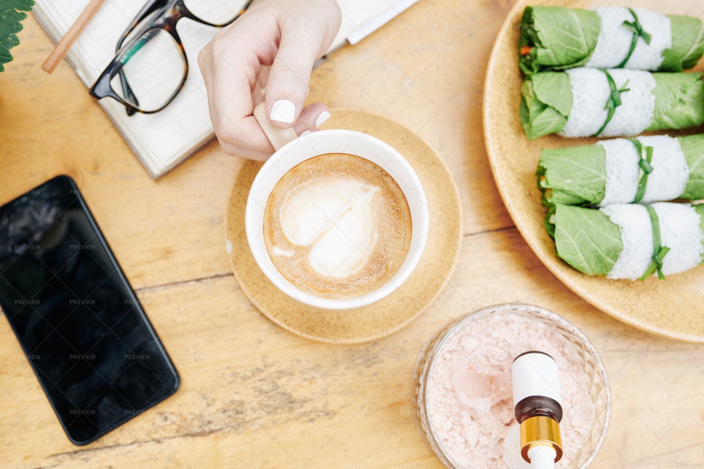 Cosmetics Brand Owner Having Coffee: Stock Photos