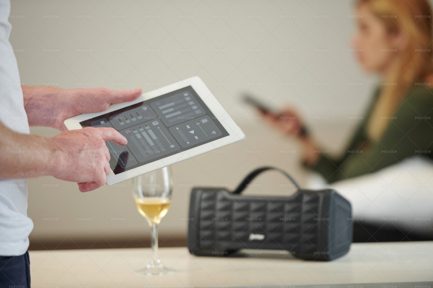 Man Increasing Speaker Volume: Stock Photos