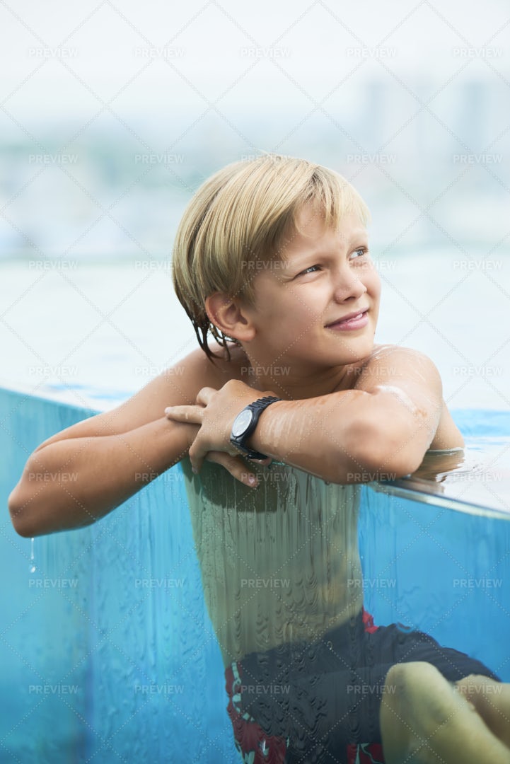Cheerful Boy Resting In Water: Stock Photos