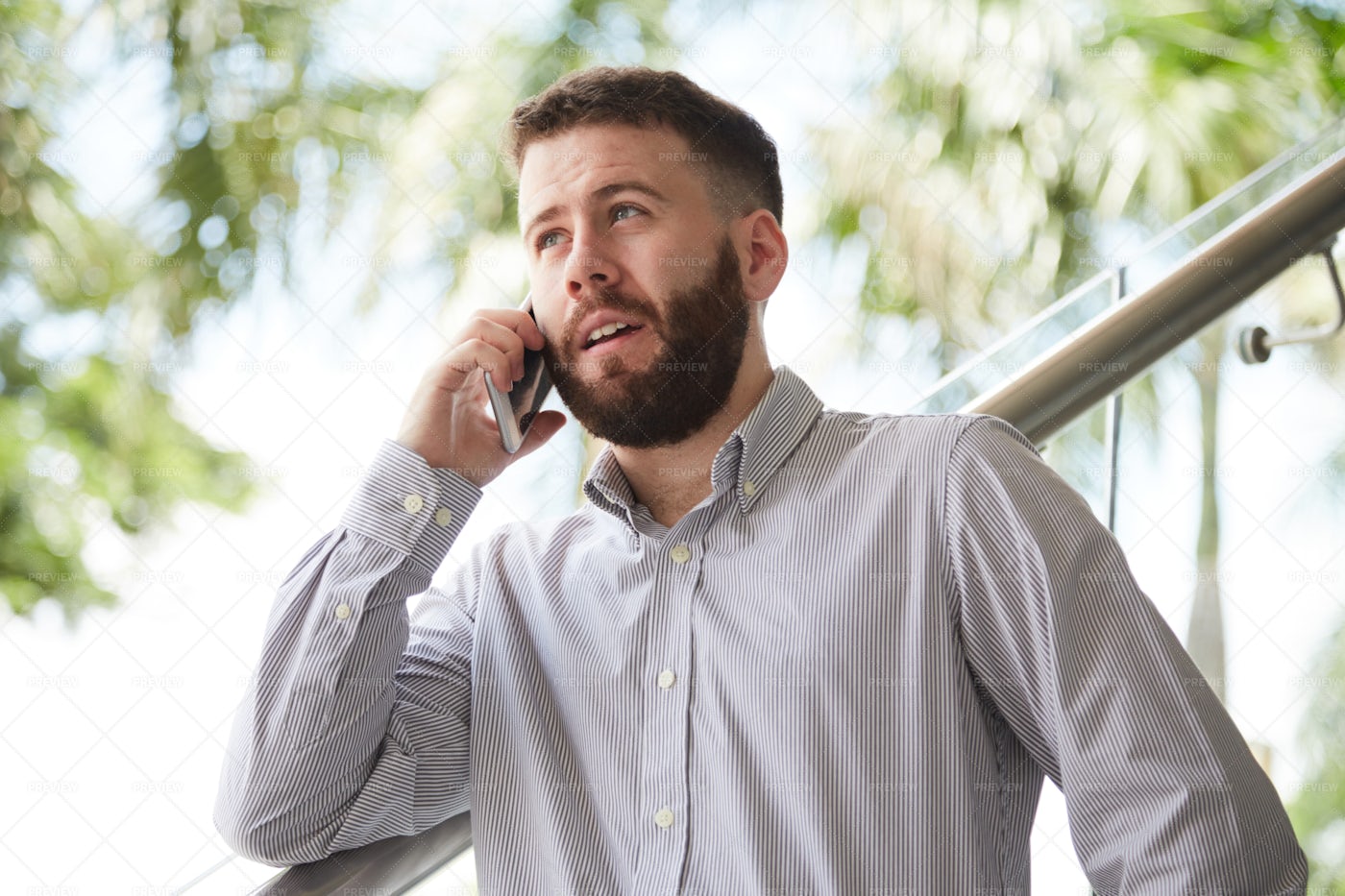 Businessman Using Mobile Phone For: Stock Photos