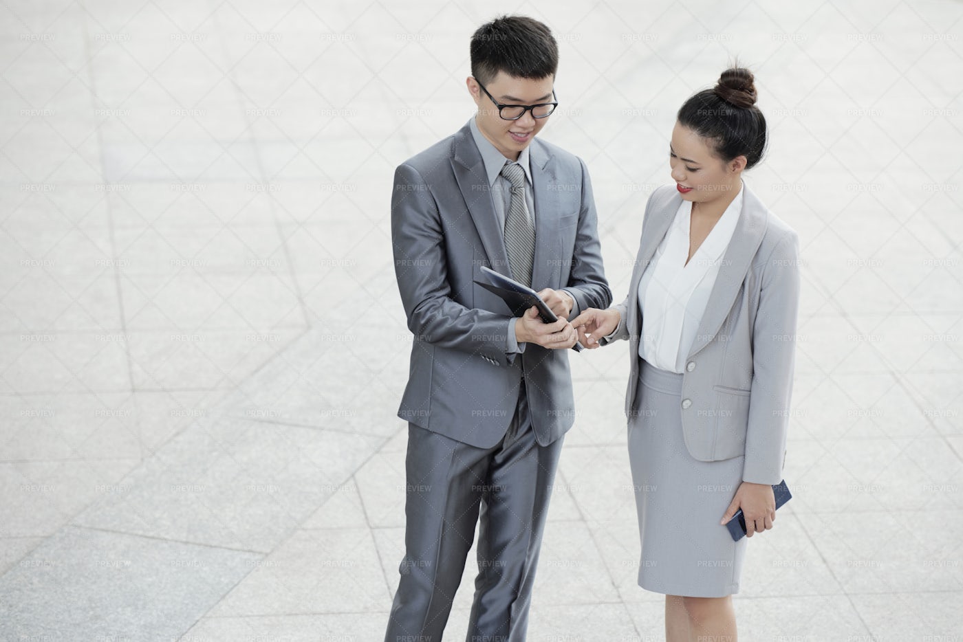 Entrepreneurs Checking Data On Tablet: Stock Photos