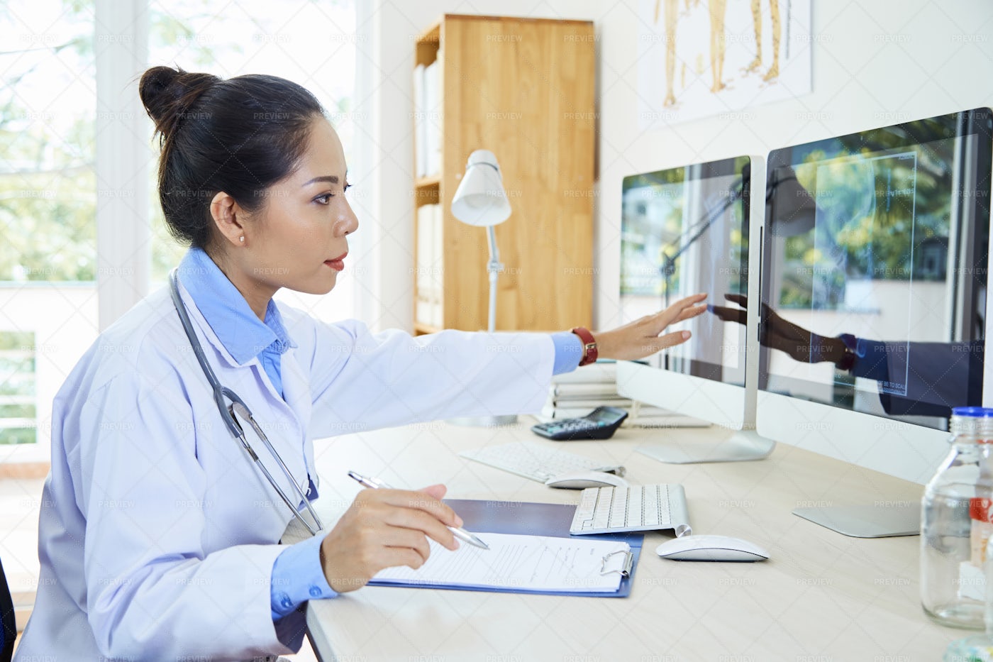 Female Radiologist Working With: Stock Photos