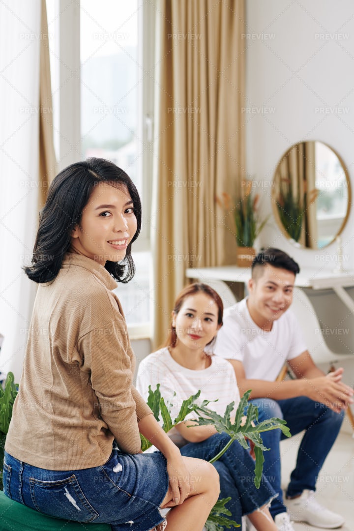 Pretty Asian Woman Attending Meeting: Stock Photos